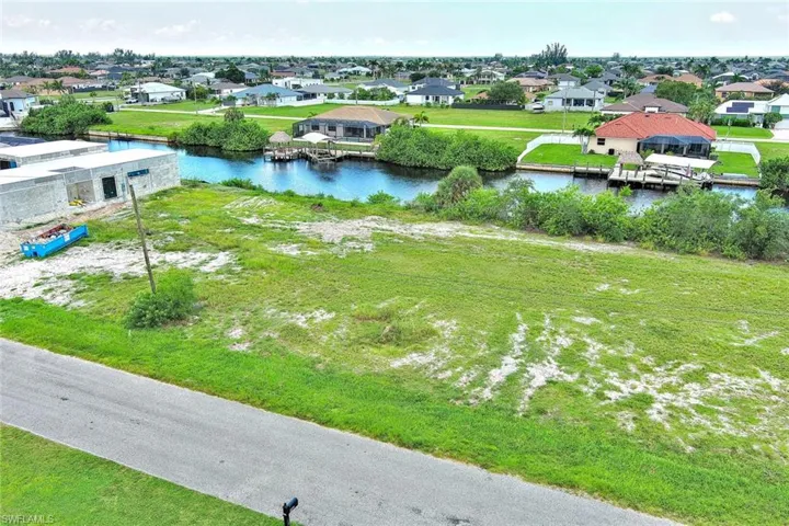 Aerial view of residential area with a nearby body of water