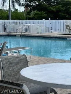 Community pool with fence