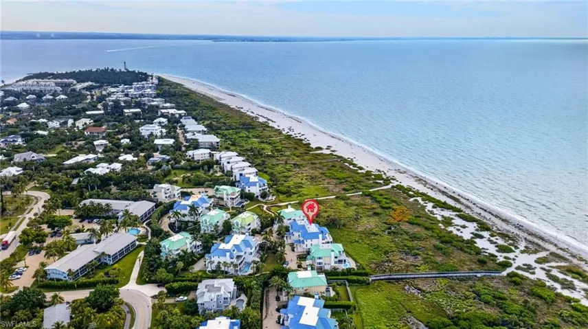 Aerial perspective featuring coastal positioning, direct shoreline proximity, and native vegetation