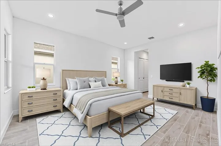 Bedroom featuring baseboards, recessed lighting, a closet, ceiling fan, and wood tiled floor