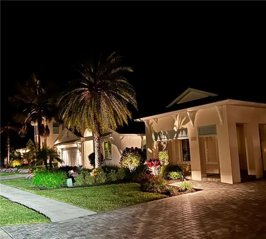 View of community featuring a lawn