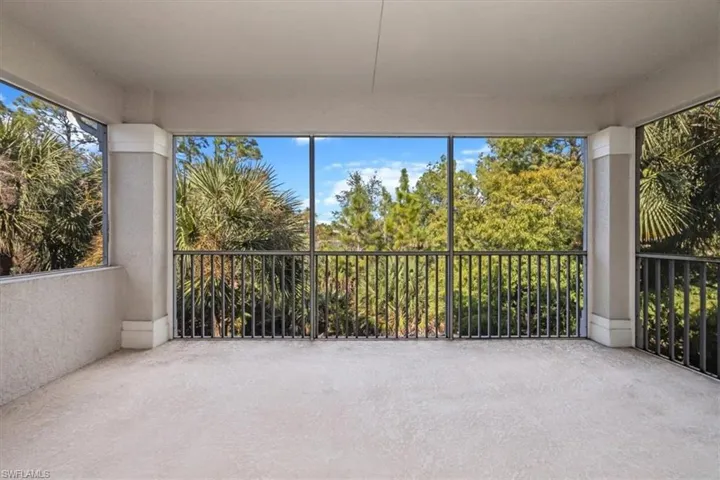 Screened balcony overlooking preserve and pond