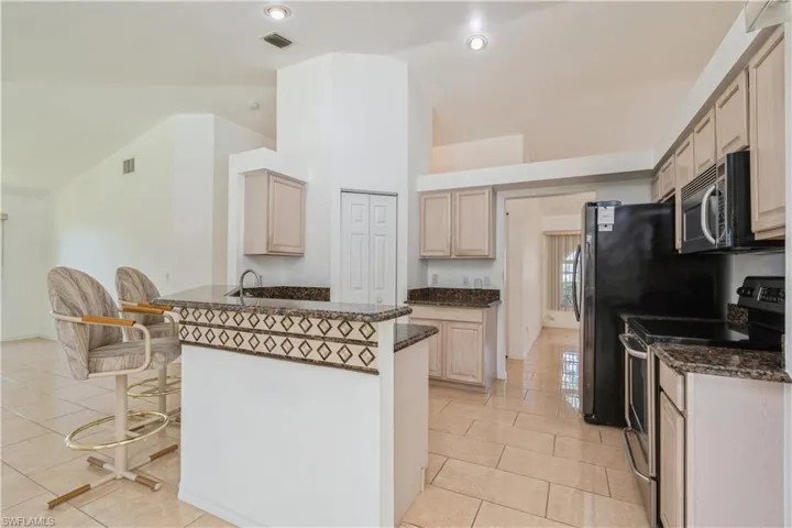 Breakfast bar with granite counters
