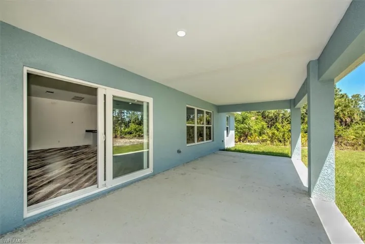 Another view of the lanai. The sliders are also double pane insulated impact resistant glass. Perfect for security and storm protection.
