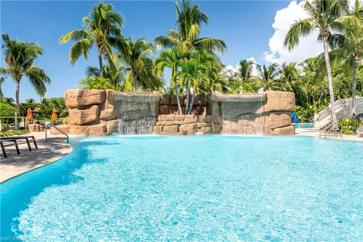 Community pool featuring a patio area