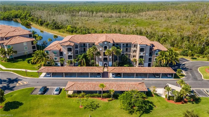 Bird's eye view of apartment complex / building and a large body of water