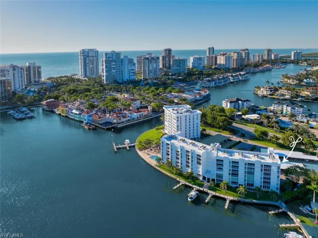 Drone / aerial view featuring a water view and a view of city