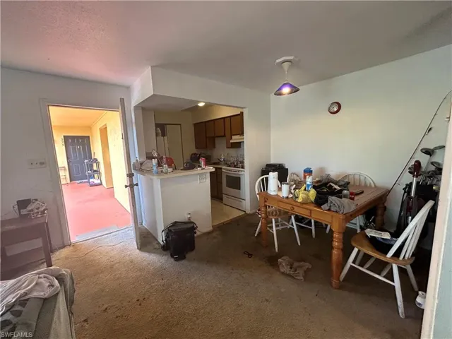 View of carpeted dining room