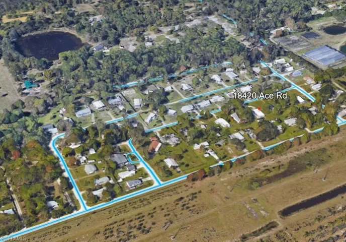 Aerial overview of property's location featuring property boundaries highlighted