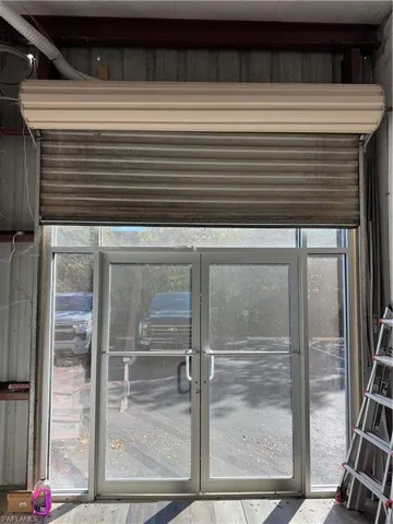 Double doors installed but can be removed with garage door.