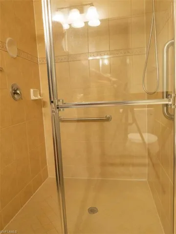 Full bath featuring a stall shower