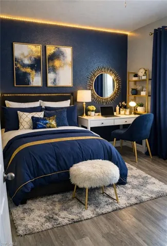 Bedroom featuring wood finished floors and a textured wall
