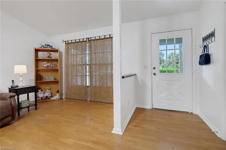 Doorway featuring light hardwood / wood-style flooring