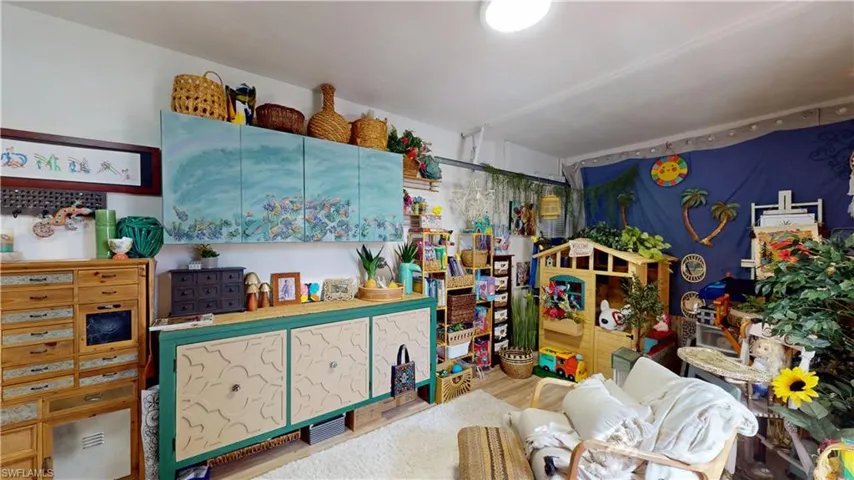 Misc room featuring  wood-style floors