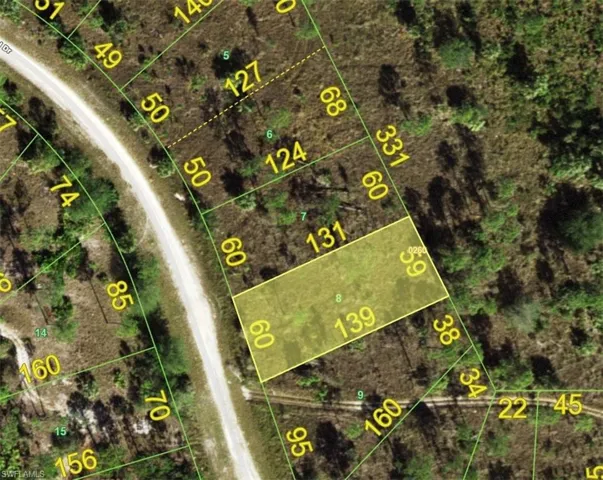 Aerial view of property's location featuring property parcel outlined