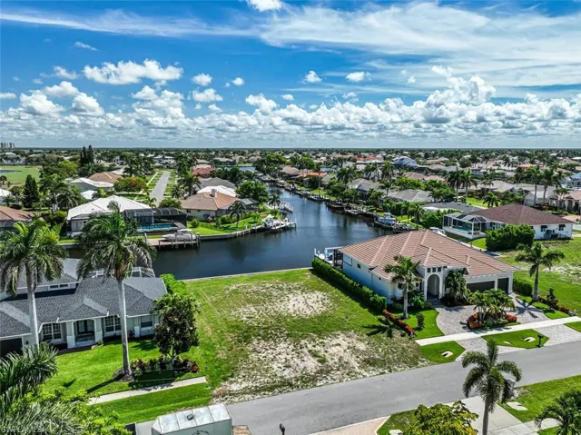 Aerial view of residential area with a nearby body of water