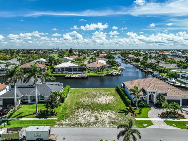 Aerial view of residential area with a large body of water