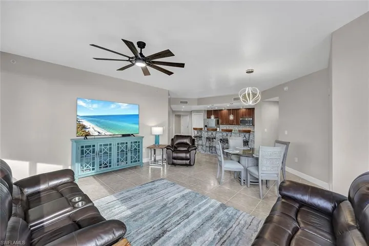 New furnishings, ceiling fan, and fresh paint throughout.