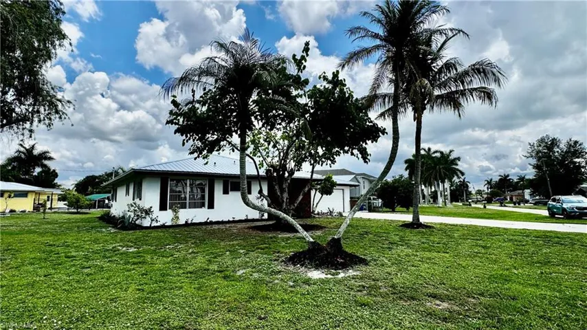 Fresh exterior white paint with black accents