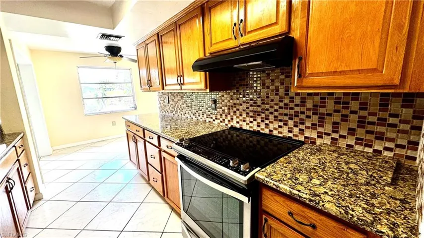 Appliances in good condition.  Pantry at the end of the kitchen
