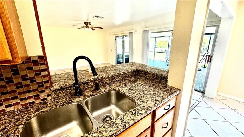 Double stainless steel sink.  Open to the family room and living room