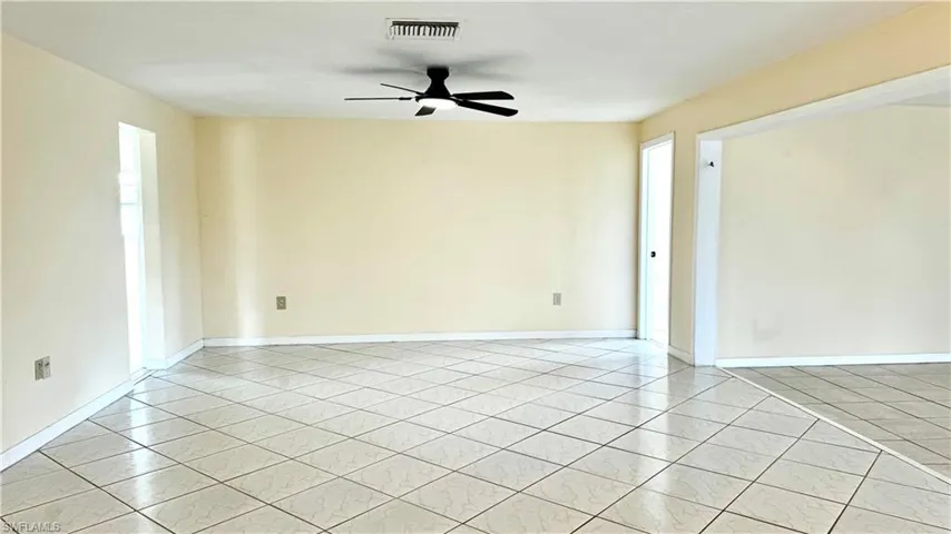 Brand new black fan with light in living room