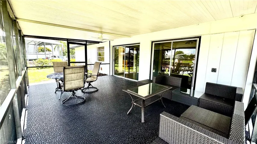 Spacious lanai - room for  seating area AND dining area with views out to the water