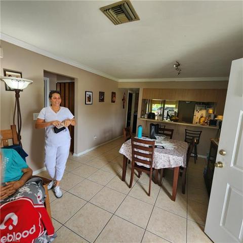 1512 Dining Rm standing at entry door