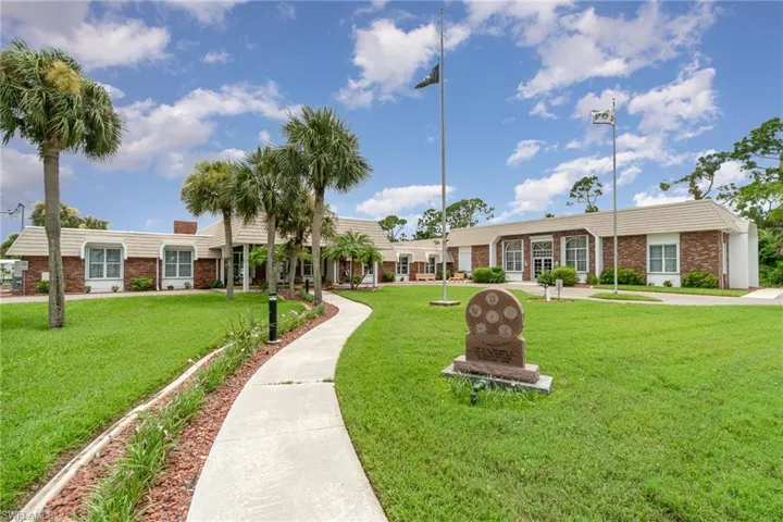 View of home's community featuring a yard
