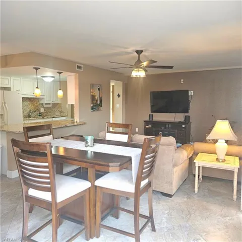 Dining room featuring a ceiling fan