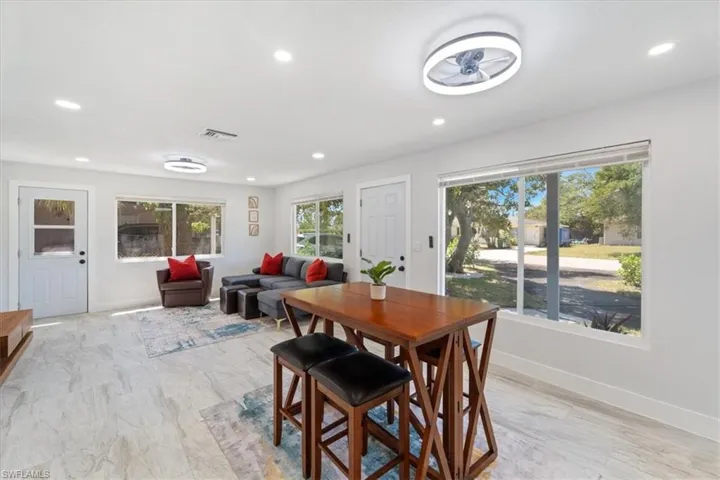 Dining space with recessed lighting, visible vents, and baseboards