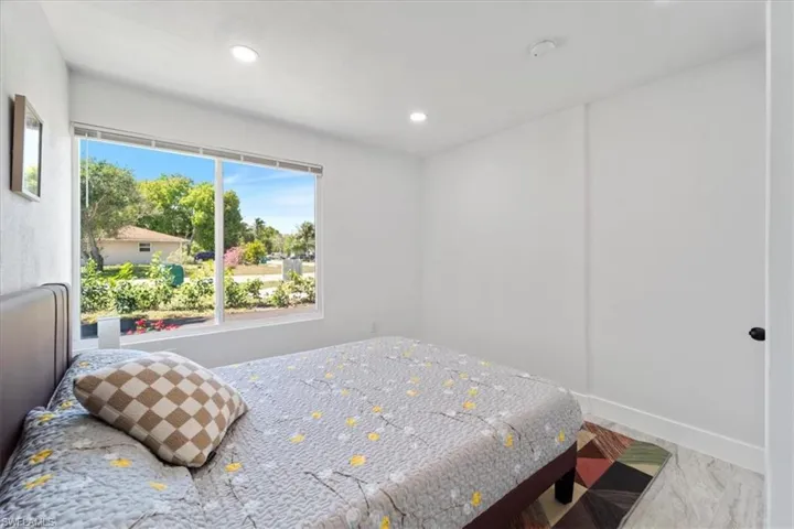 Bedroom with recessed lighting
