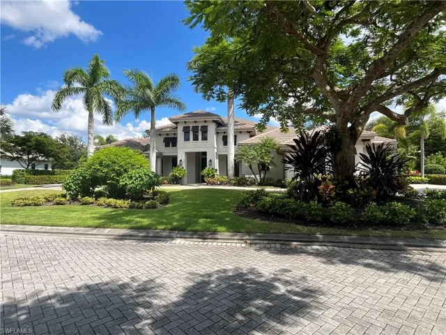 View of front of property with a front lawn