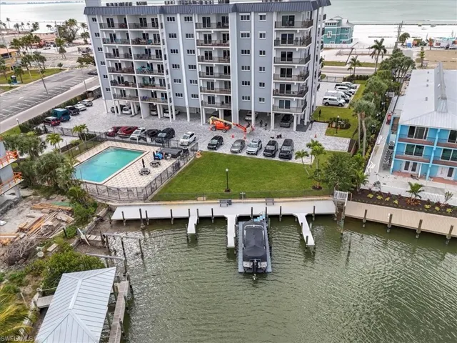 Bird's eye view of a large body of water and apartment complex