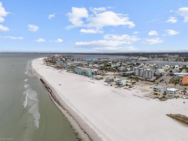 View of urban area with expansive beach