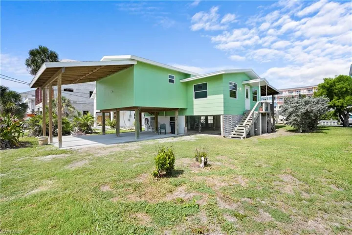 High carport and is raised with under home access.