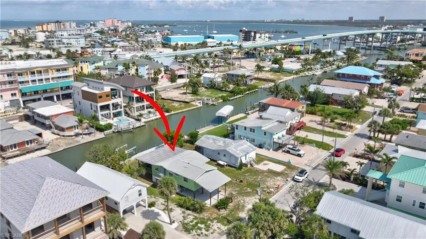 THE BEST Ft Myers Beach sail boat access LOCATION! The first canal past the Ft Myers beach high bridge,. See the bridge to the right.  Located in the small Ft Myers Beach area that is ZONED FOR WEEKLEY RENTALS.