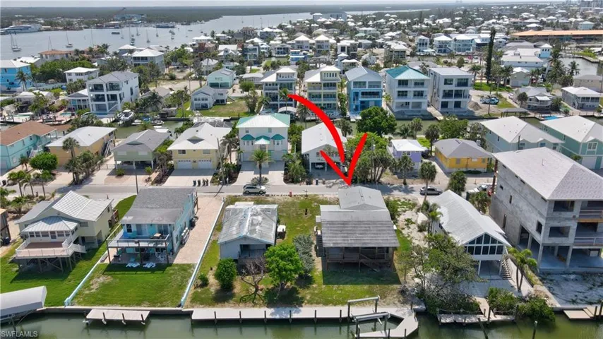 FANTASTIC GULF water access! Two side by side lots available. Composite deck dock across both properties. The captain's walk and boat lift are on this property 171 Primo Dr. the neighboring lot 191 Primo Dr is also available. The opportunity to have two lots in this amazing location is an unheard of. Act fast!