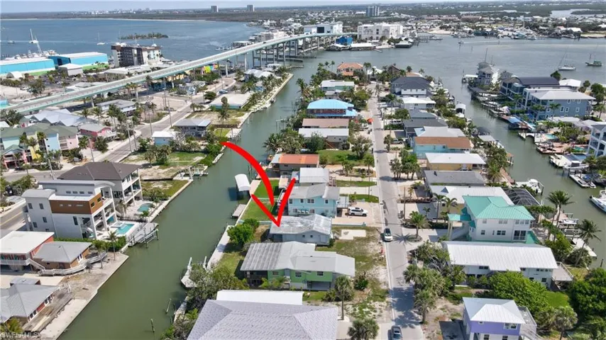 AMAZING LOCATION! The first canal on Ft Myers Beach past the bridge coming on the beach. Sailboat access, walk to Town Square. BOTH LOTS ARE AVAILABLE!