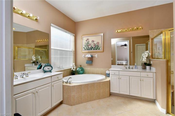 Master bathroom- dual sinks, garden tub and walk in shower