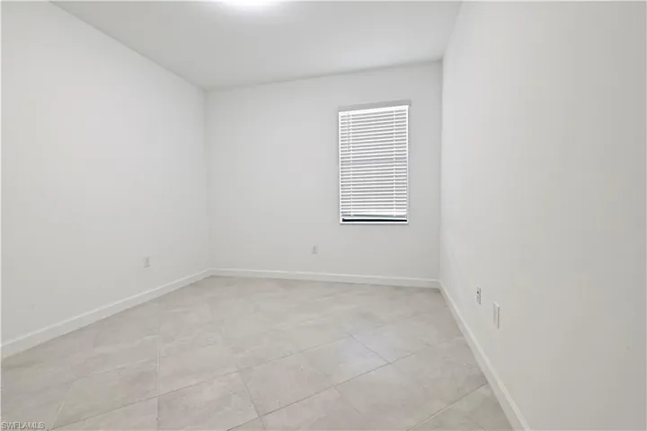 Empty room with baseboards