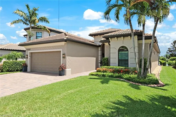 Mediterranean / spanish house featuring a front yard