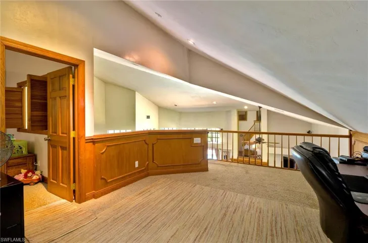 Spacious loft area with vaulted ceiling