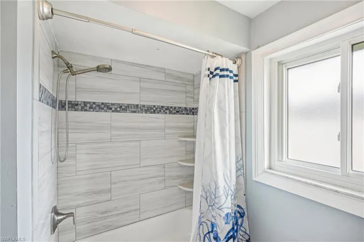 Bathroom with shower / bath combo