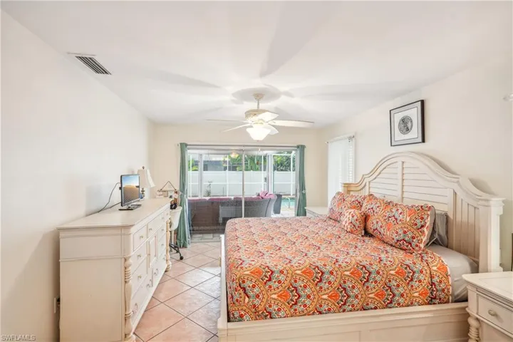 Bedroom featuring ceiling fan and light tile patterned flooring
