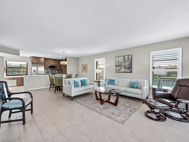 Living room featuring light tile patterned floors