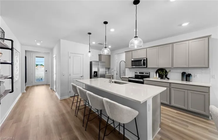 Photos are from a furnished model. Options for this home may vary.