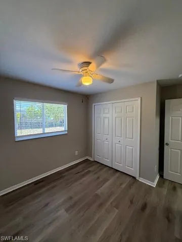 Bedroom, featuring a ceiling fan, LV flooring.