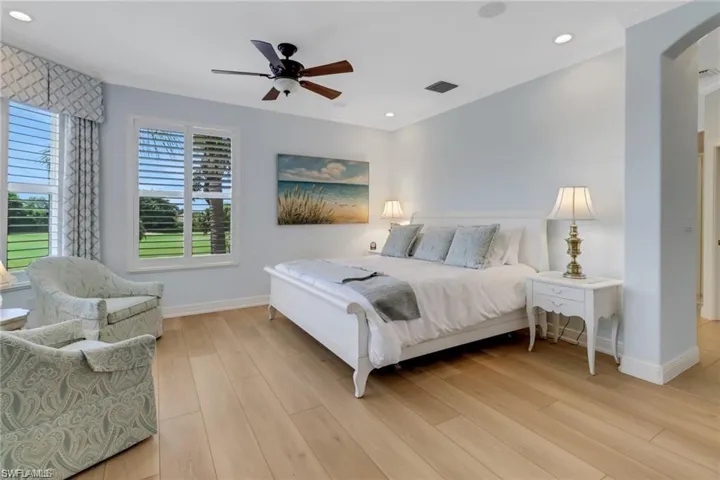 Bedroom featuring ceiling fan and light hardwood / wood-style floors