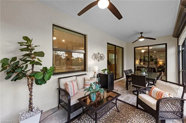 Tiled lanai with plenty of room for both casual outdoor seating and dining area